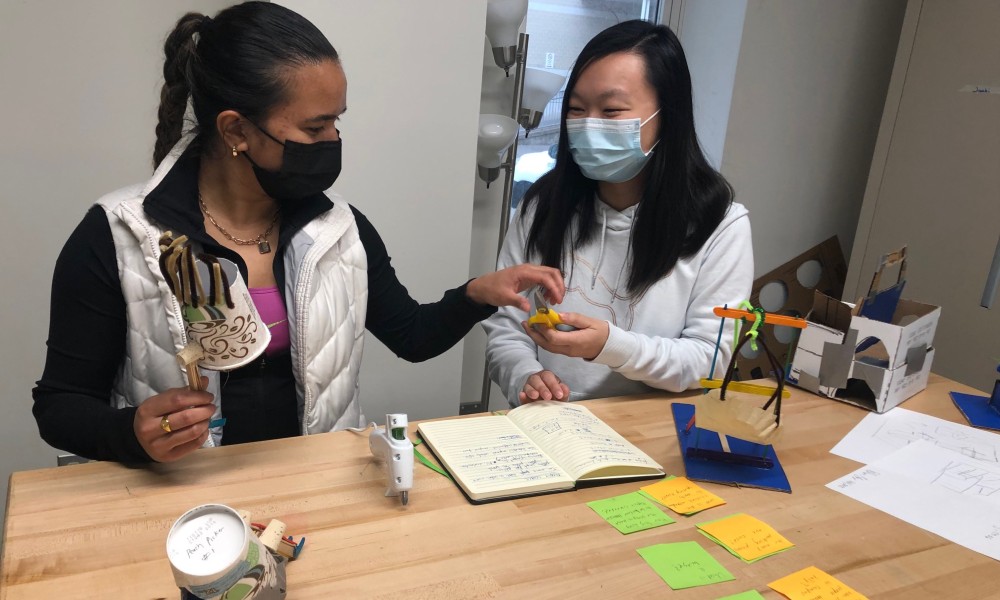 Female students working on engineering project