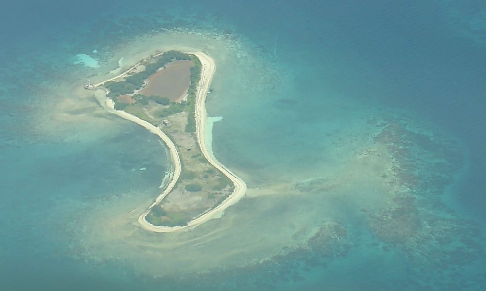Coast of La Gonave surrounded by coral reef