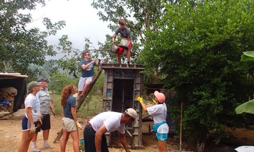 Volunteers working to provide clean water in Uganda