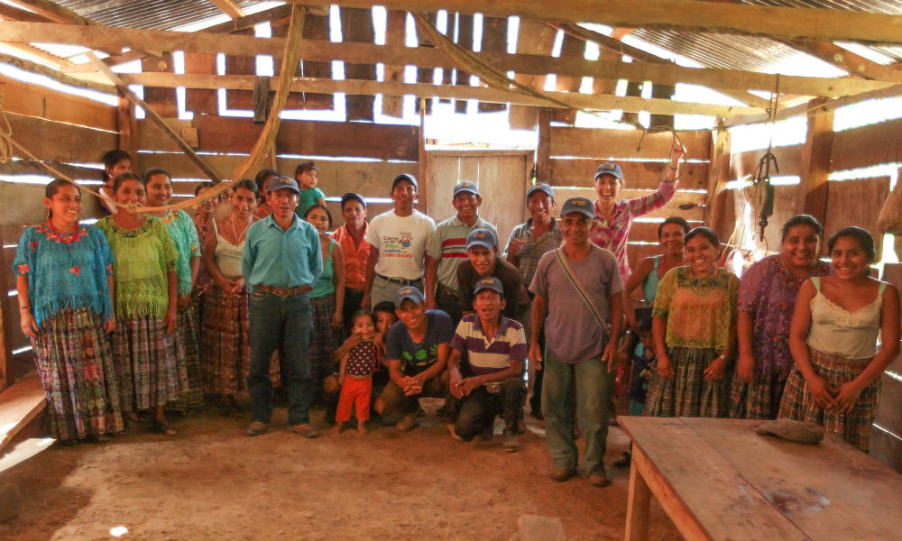 Monica Rogan with the farmers of San Juan Chivite