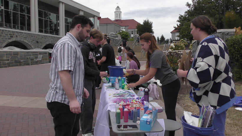 Madison Center Staff tabling at Warner Commons