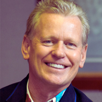 Professional headshot of G.J. Hart