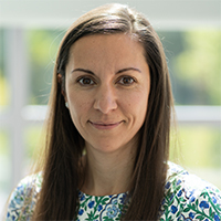 Professional headshot of Eliz Ozcan