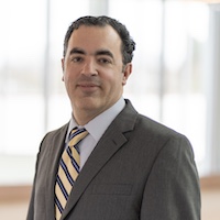 Professional headshot of Fariss Mousa