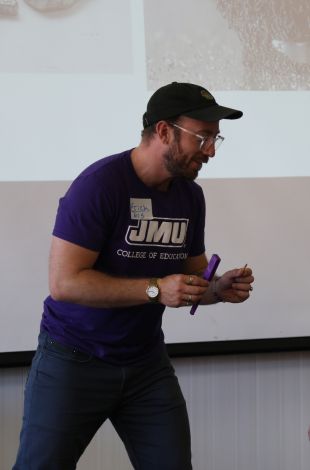 teacher talking to students