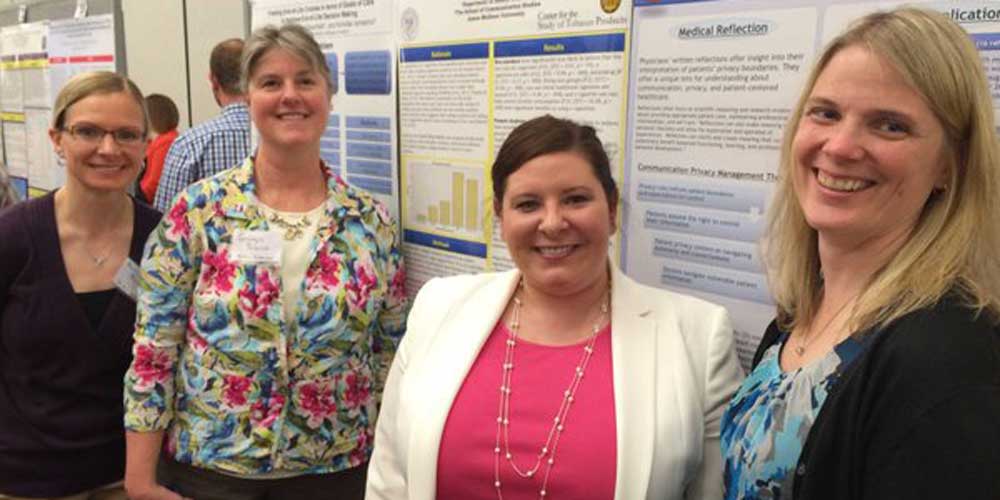 Heather Carmack and other poster presenters at DCHC 2015