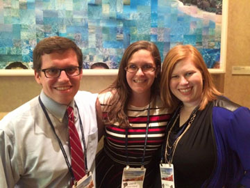 Students pose for a photograph after presenting their research at NCA15