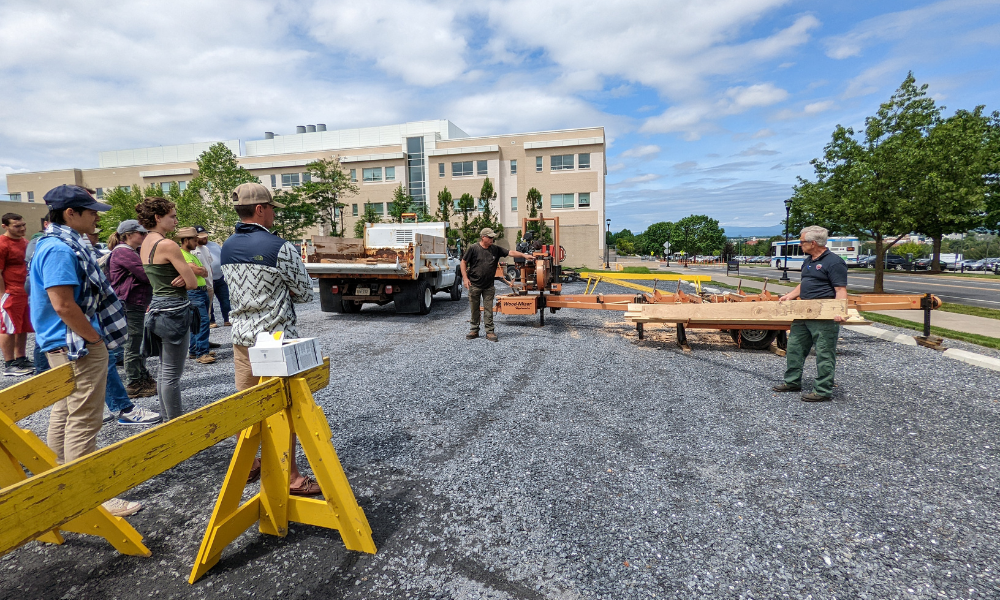 Sawmill demonstration during a community partner Urban Tree Workshop on campus