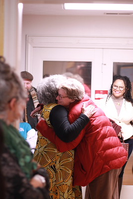 Dr. Gabbin and Dean of Libraries Dr. Bethany Nowviskie share a hug