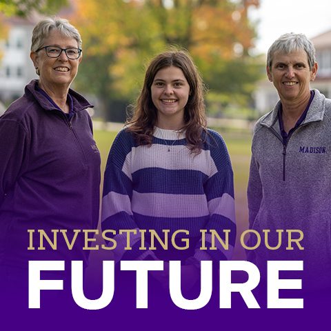 Investing in our future, two donors stand with their scholarship student