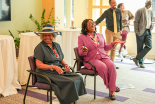 Ghana ambassador talking with JMU student