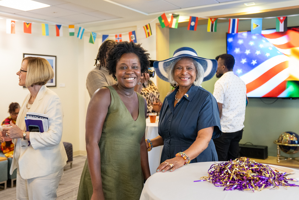 Ghana Ambassador poses for a photo 