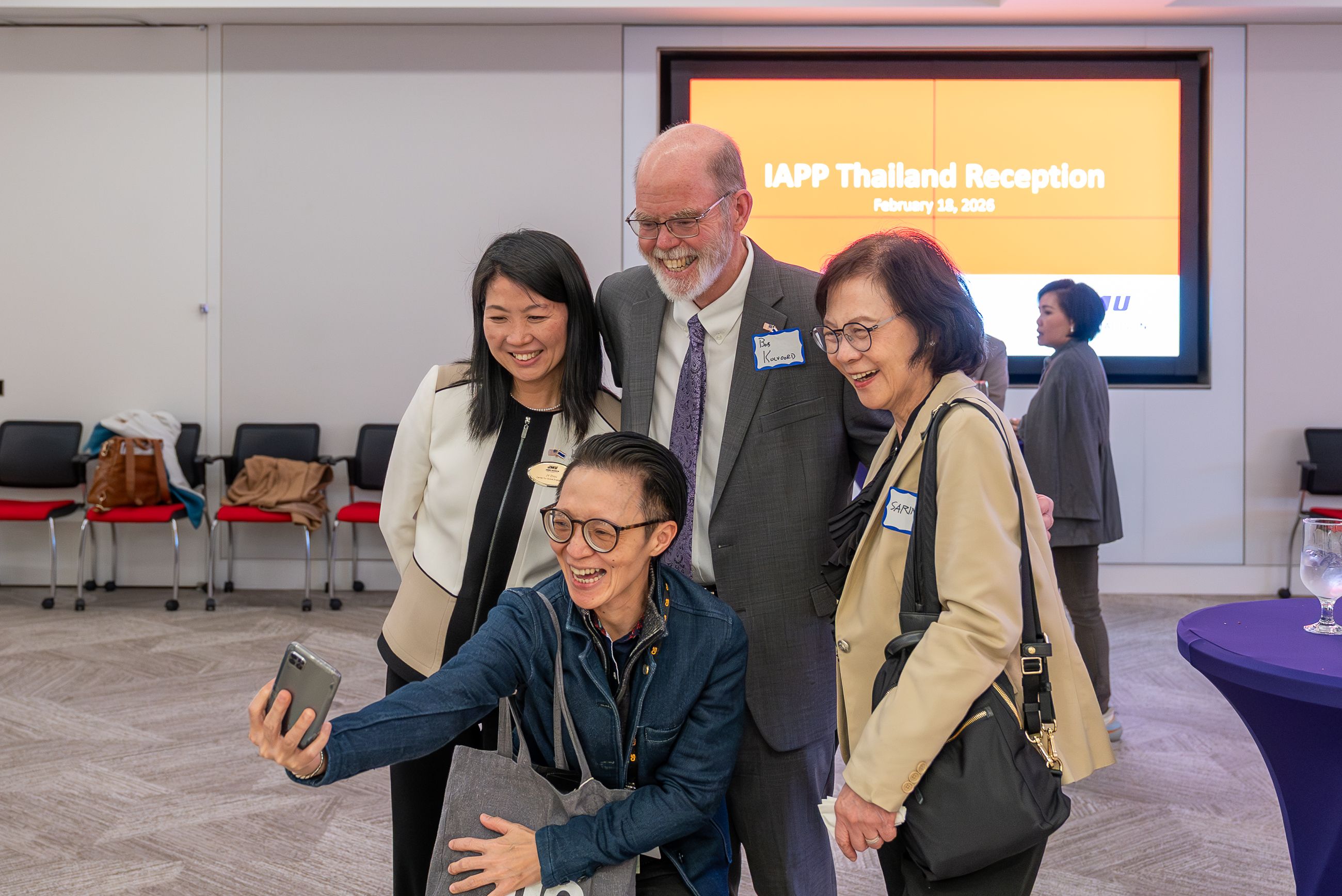 Provost Bob Kolvoord and CGE Executive Dircetor JY Zhou take a selfie with guests from Thailand
