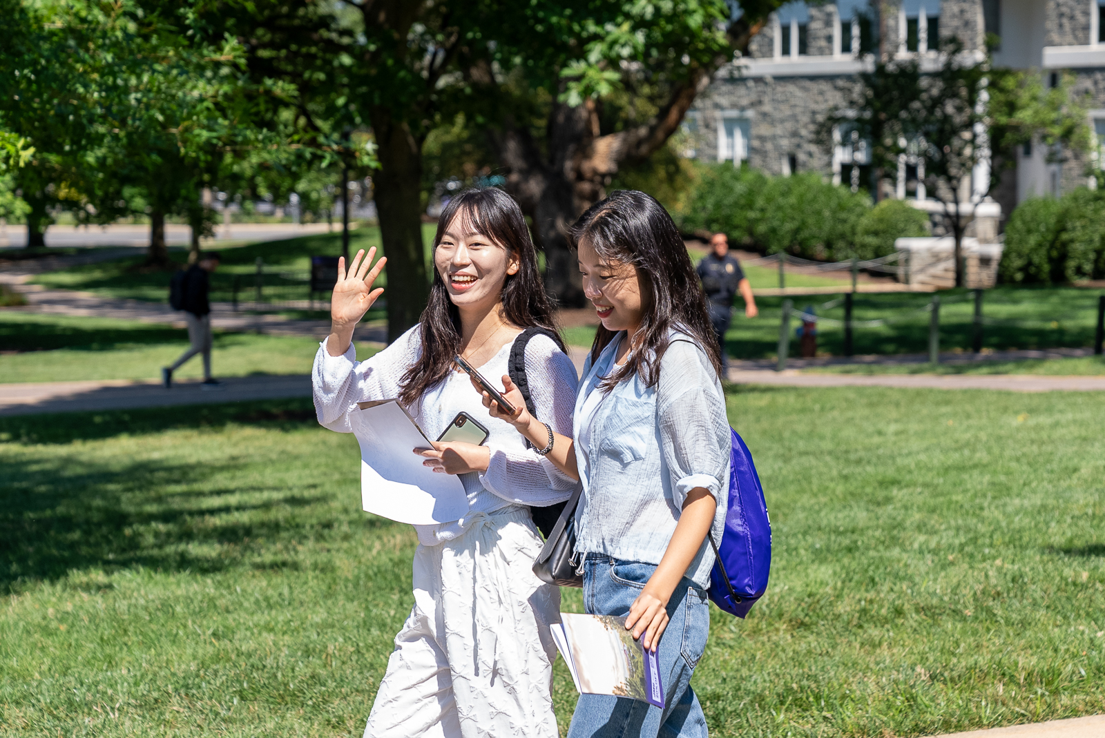 2 KDU students walking on JMU campus
