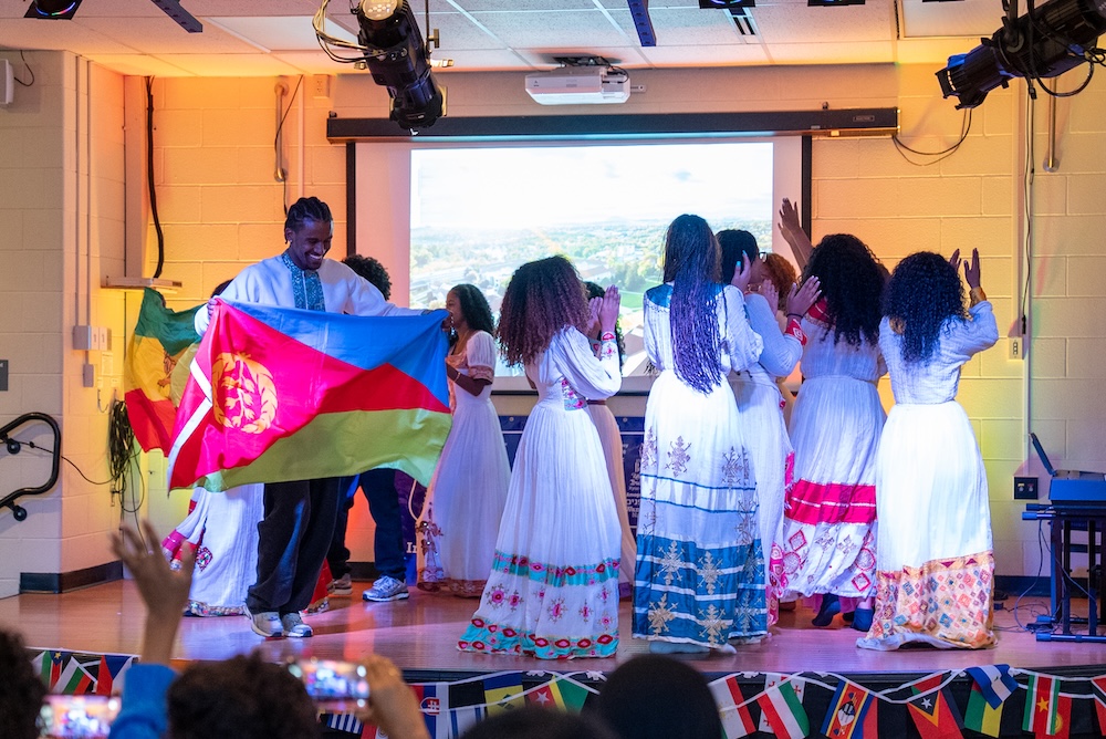 Student group dancing at International Variety Show. 