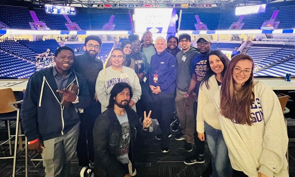 Graduate basketball game group photo