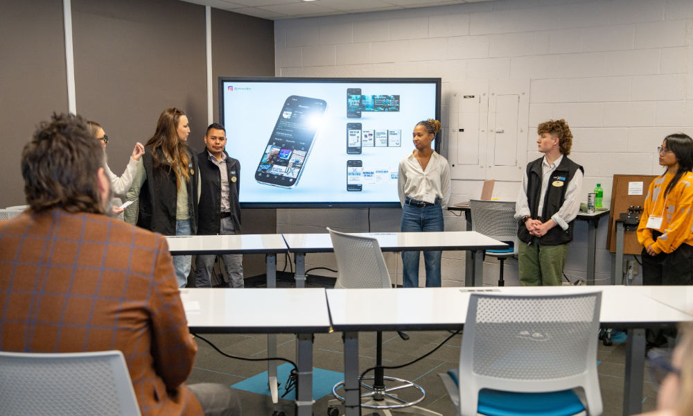 Innovation & Impact Student Fellows present their work to attendees at the Solutions Showcase.