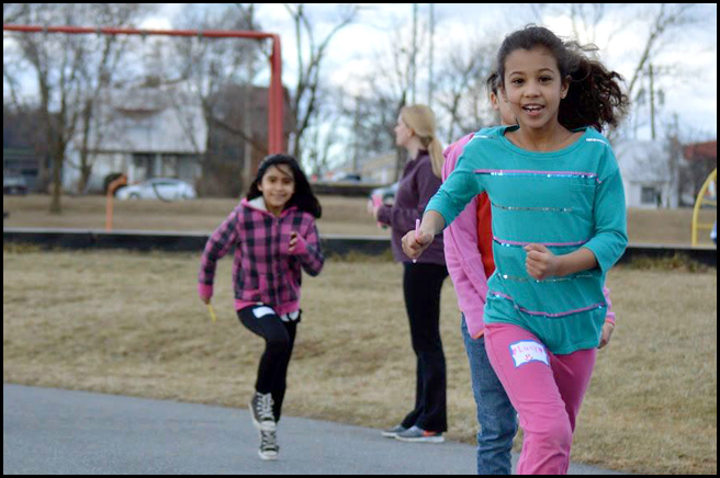 PHOTO: girls running on a track