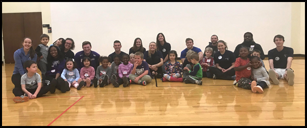 PHOTO: group of kids and staff in a gym