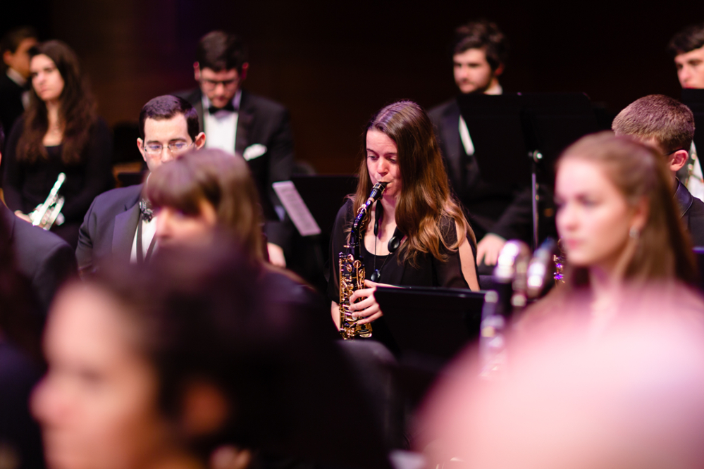 Saxophonist performing in wind ensemble