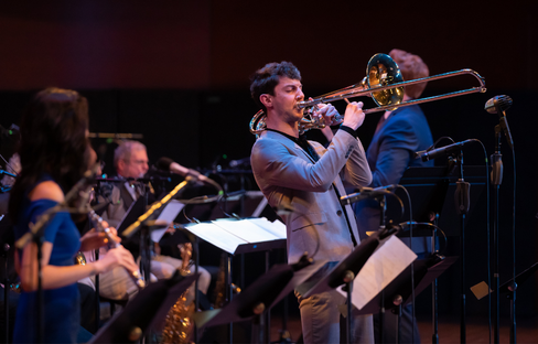 Trombone player performing with jazz ensemble