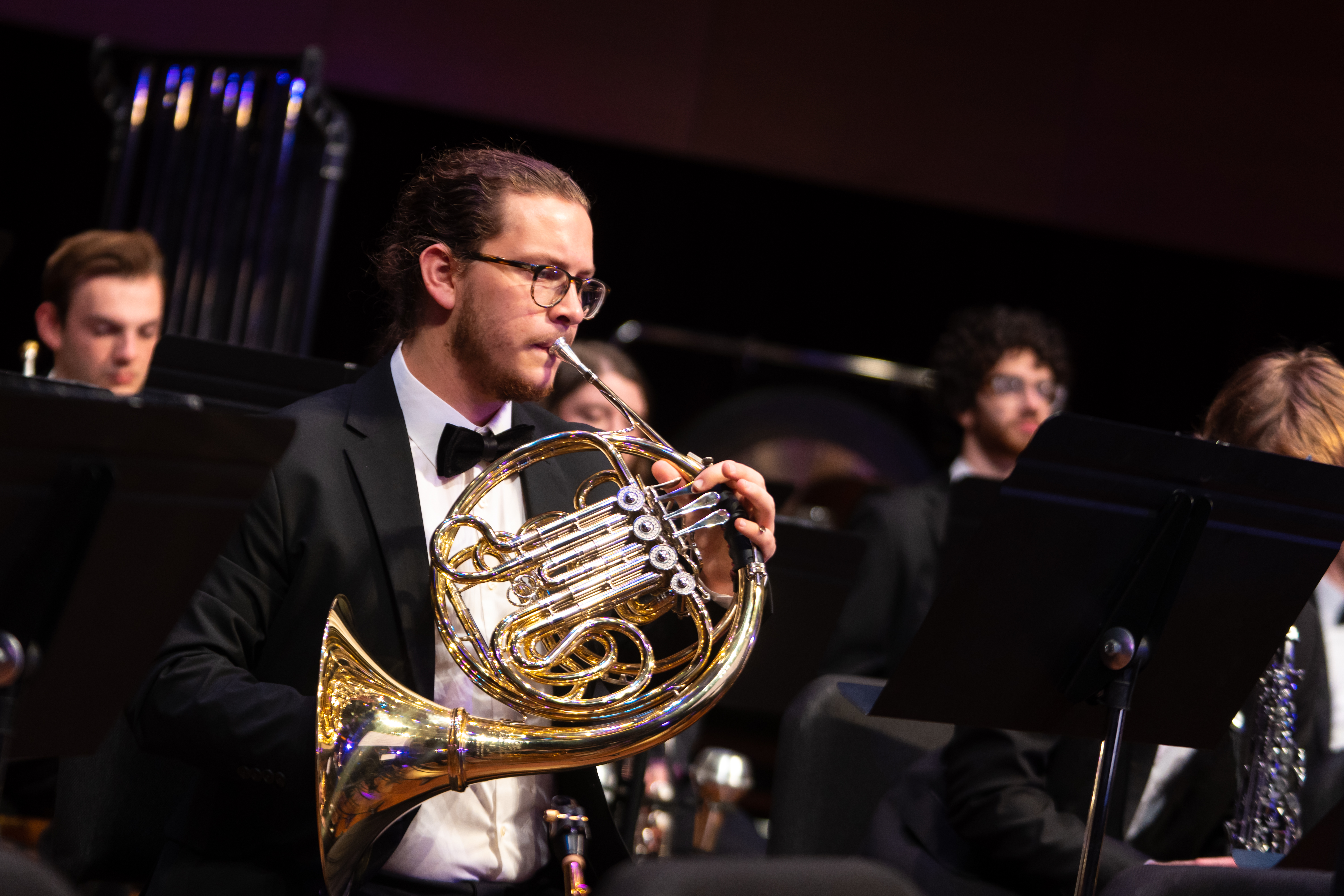 French hornist performing