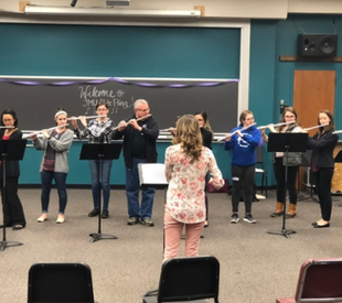 Flute choir rehearsing