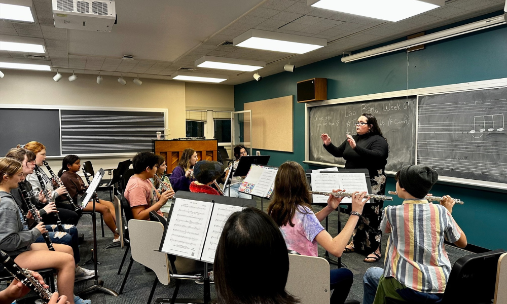 Concert band practicing in classroom
