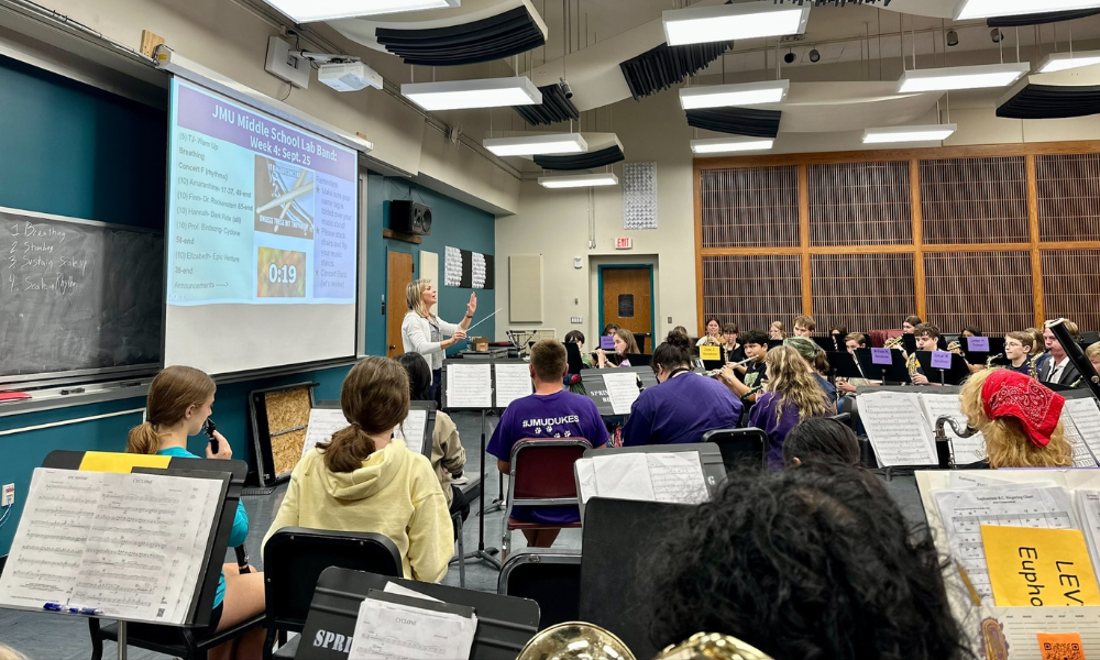 Concert band practicing in classroom