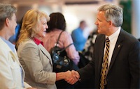 Photo of JMU President-elect Jon Alger greeting a staff member.