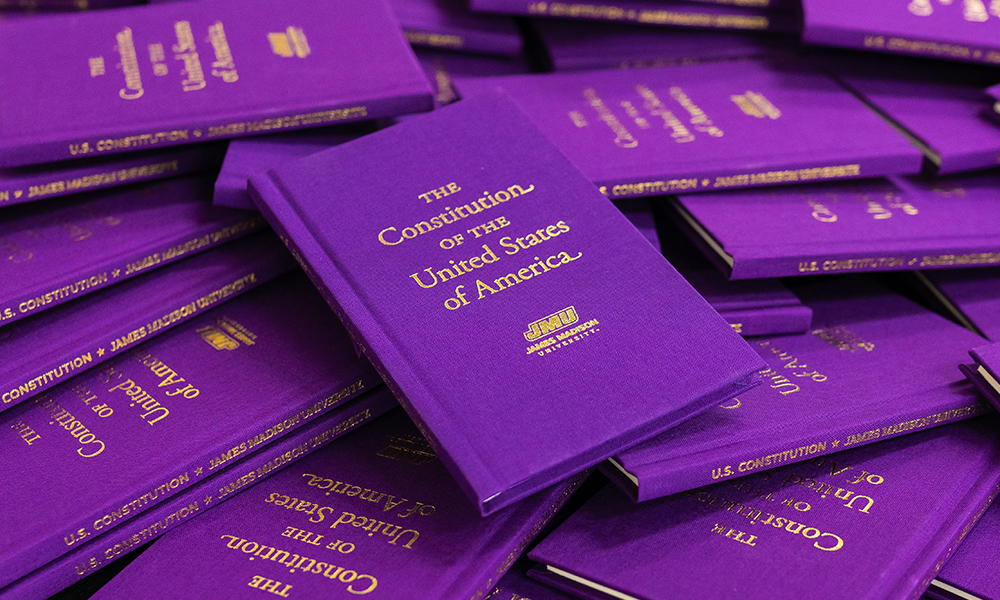 Purple pocket Constitution books