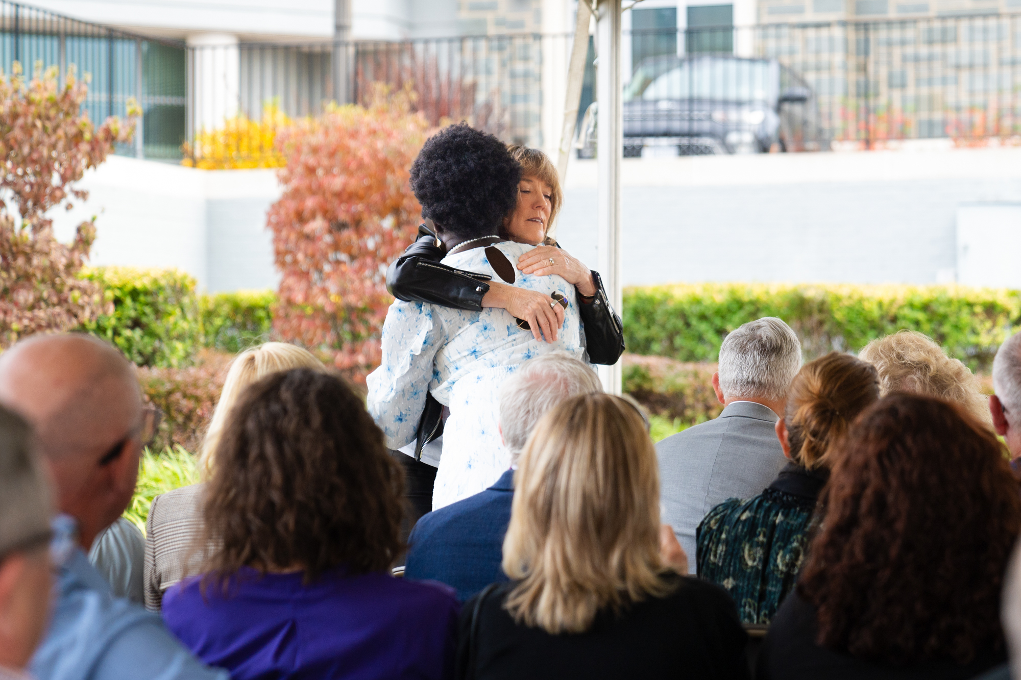 Moved by the JMU student’s story, Yates embraces Sock.