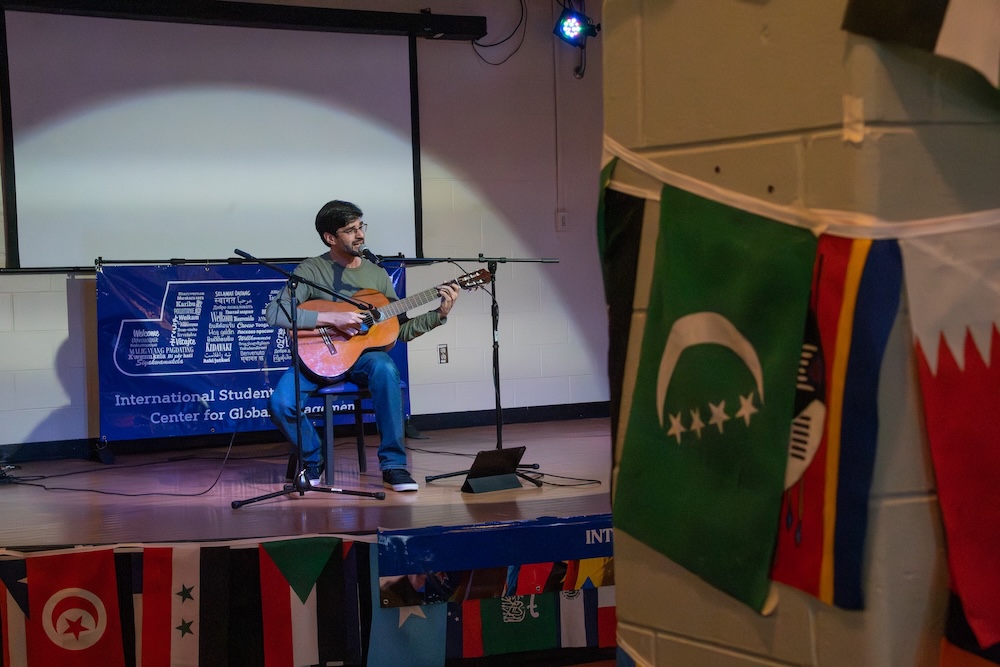 Students performing a cultural dance during International Week, showcasing their heritage and promoting global awareness.