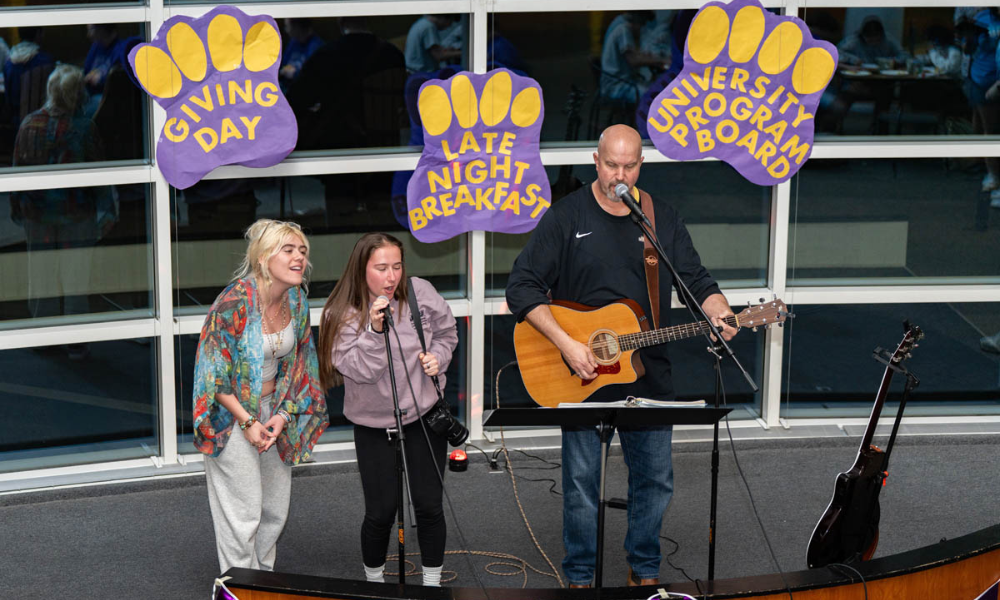 a student and Dr. Tim Miller performed together at LNB.