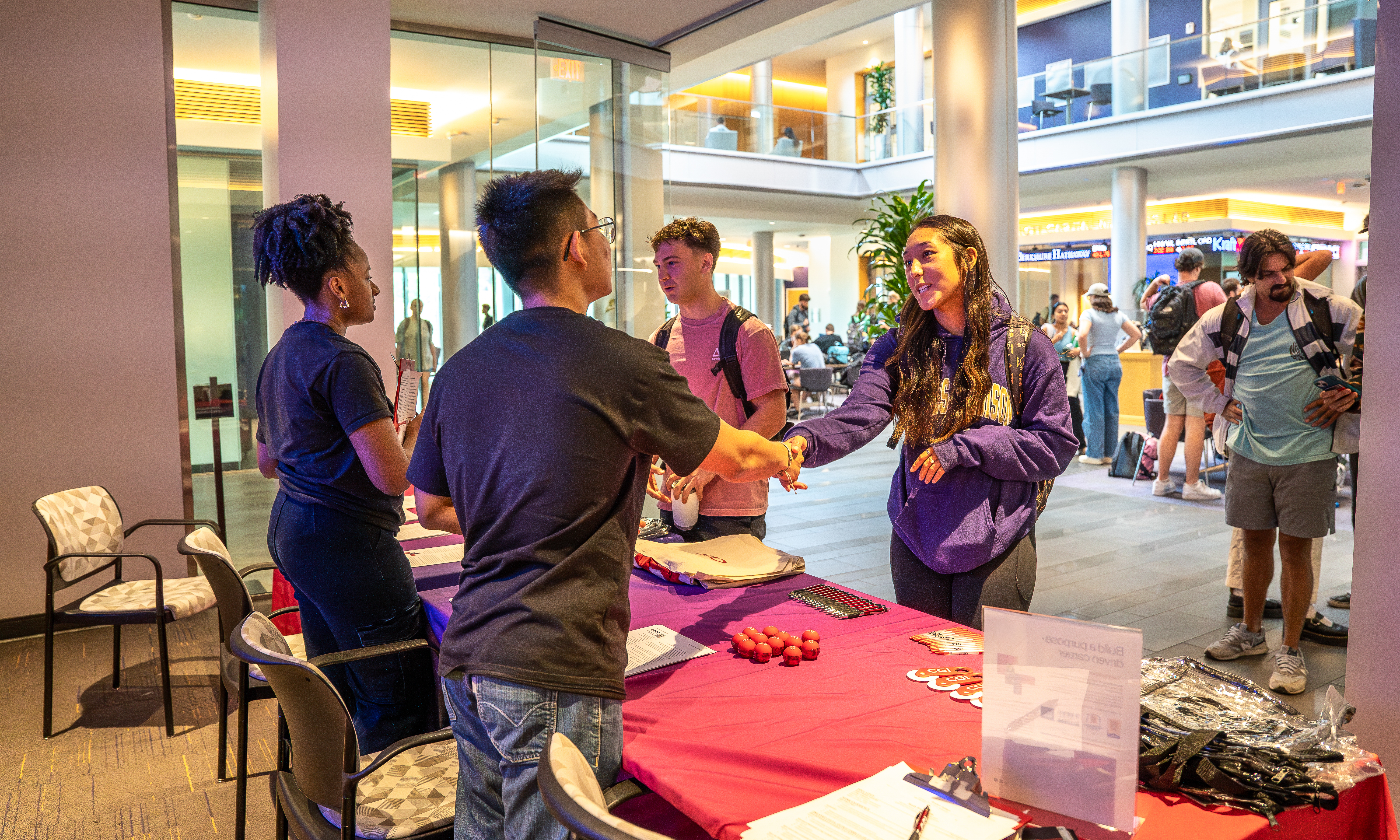 image of students meeting with recruiters within Hartman Hall