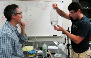 Dr. Klebert Feitosa and senior Anthony Chieco in the lab.