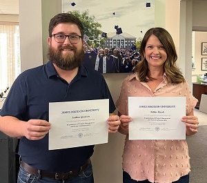 people holding certificates