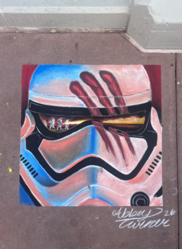 Chalk drawing of a Star Wars stormtrooper helmet with red claw-like marks across the visor.