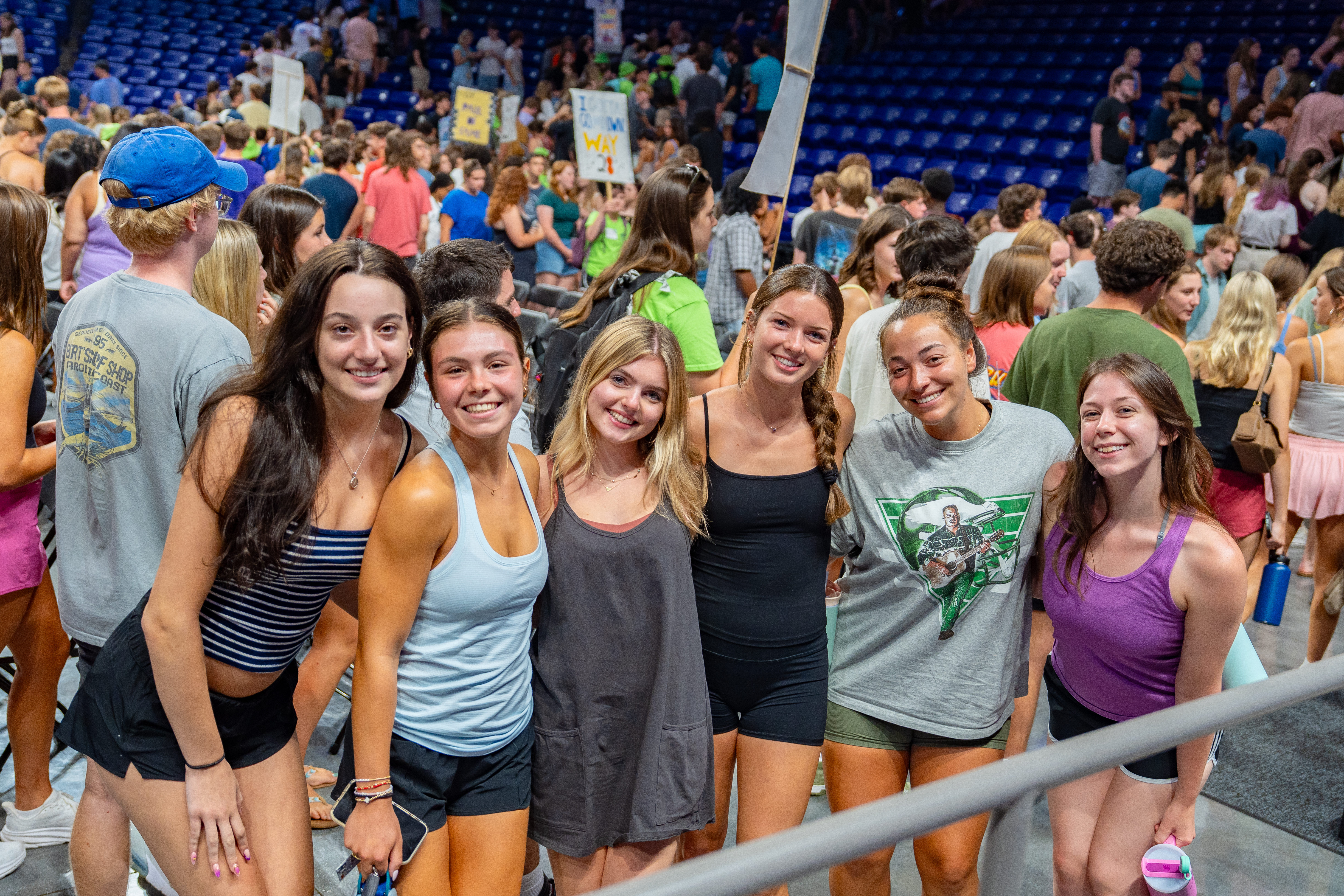 Group of female students posing for a photo at New Student Convocation.