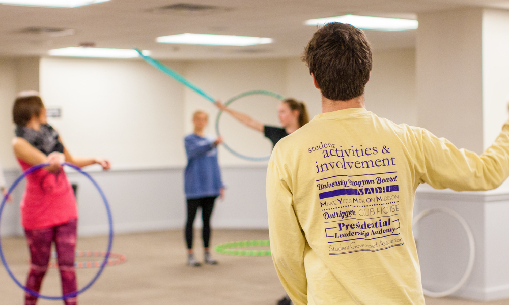 students hula hooping