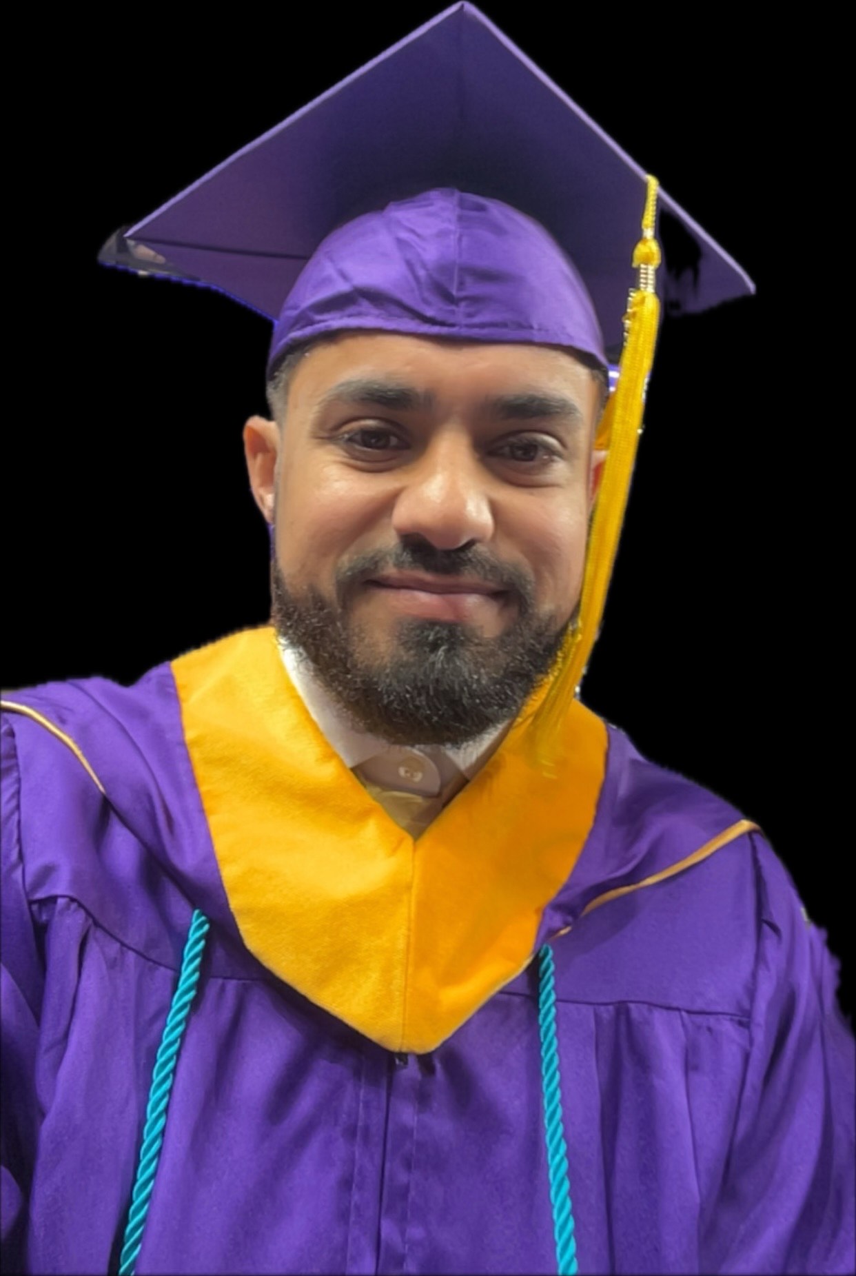 Male BIS ADP Graduate wearing purple cap and gown