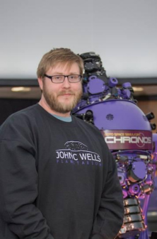 Science Camp Director standing in the planetarium
