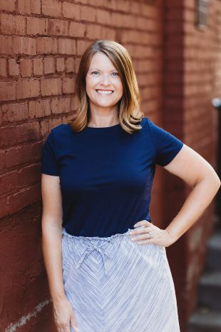 smiling woman with shoulder-length hair