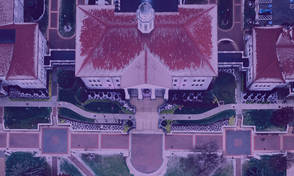 Aerial view of Wilson Hall with snow