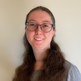 Image of woman with glasses and long hair