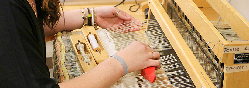 student at loom