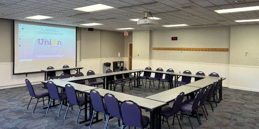 Taylor 404 setup in Hollow Square style seating viewed from left rear of room