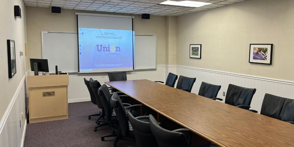 Taylor 311 boardroom setup viewed from left rear of room