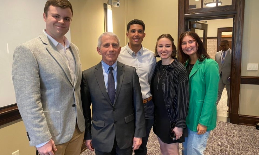<span class="submesa"><span class="slidetitle">Democracy Fellows Meet Dr. Anthony Fauci</span></span> Civic fellows and Dr. Anthony Fauci