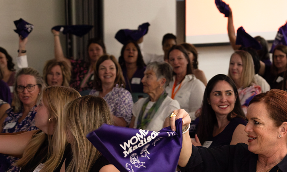 attendees waving rally towels